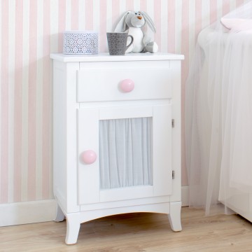 Table de chevet enfant avec porte et rideau rose, poignée rond blanc